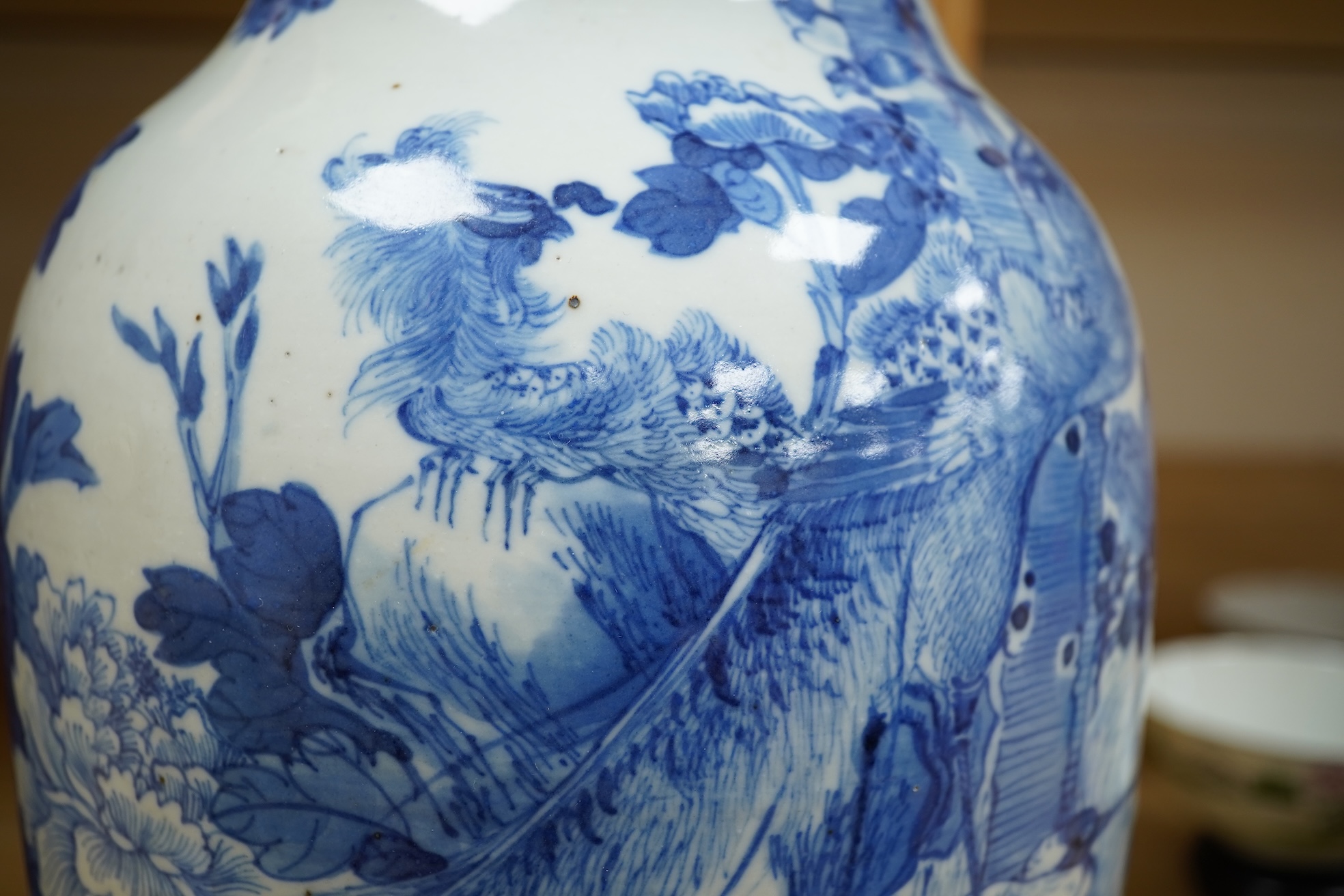 A late 19th century Chinese blue and white ‘Hundred Birds’ baluster vase, 44cm high